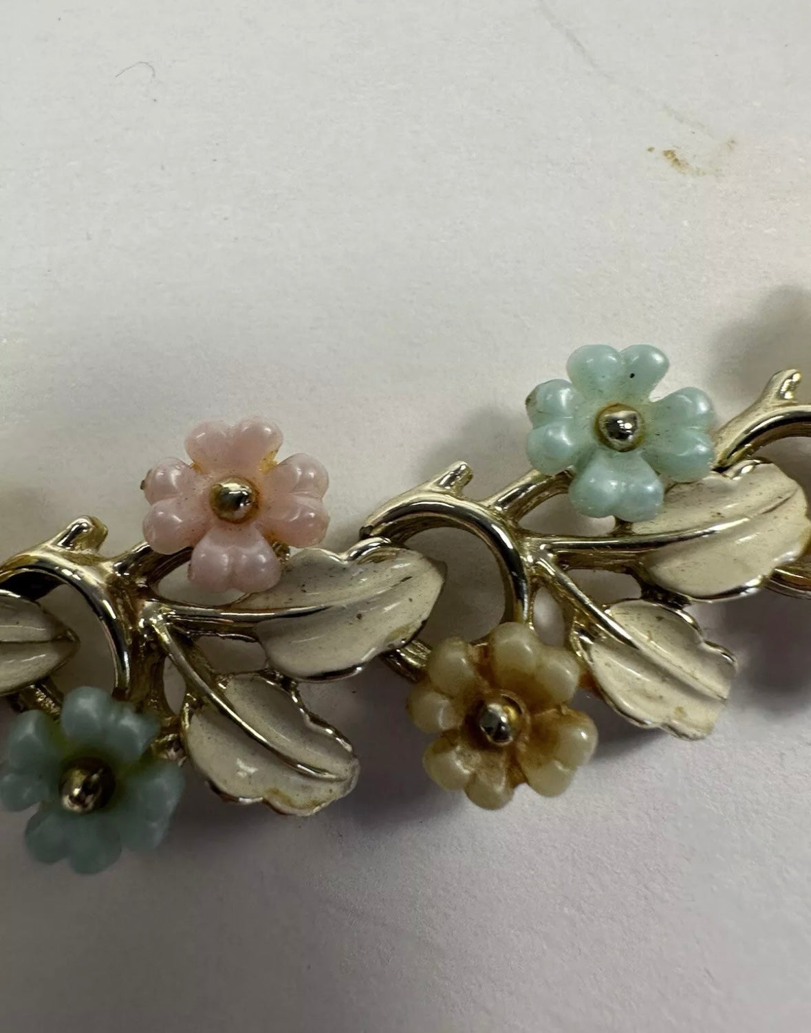 Mid Century Modern floral necklace with pastel enamel over gold toned metal