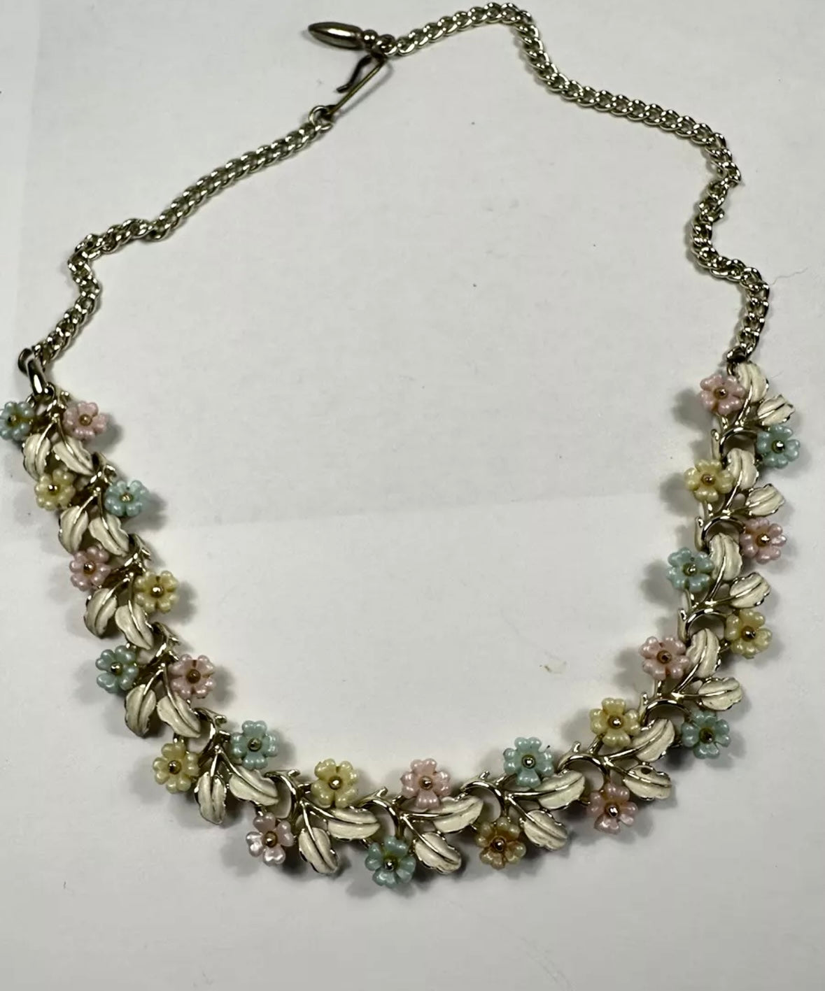 Mid Century Modern floral necklace with pastel enamel over gold toned metal