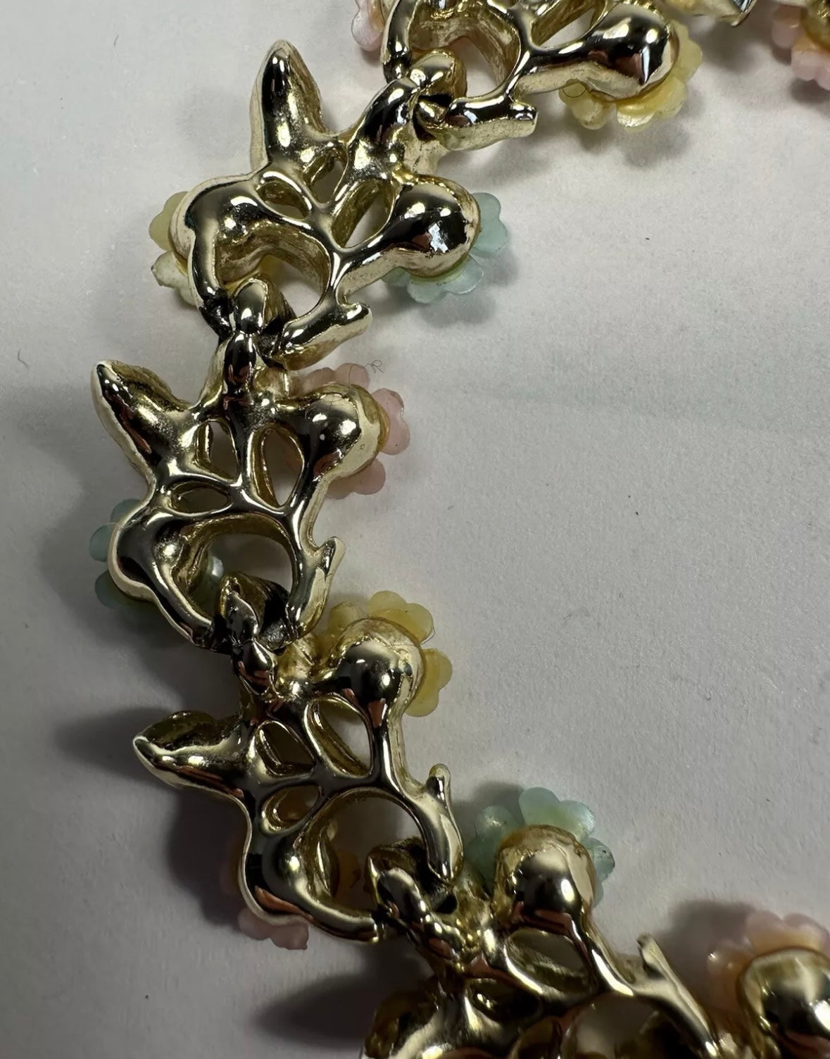 Mid Century Modern floral necklace with pastel enamel over gold toned metal