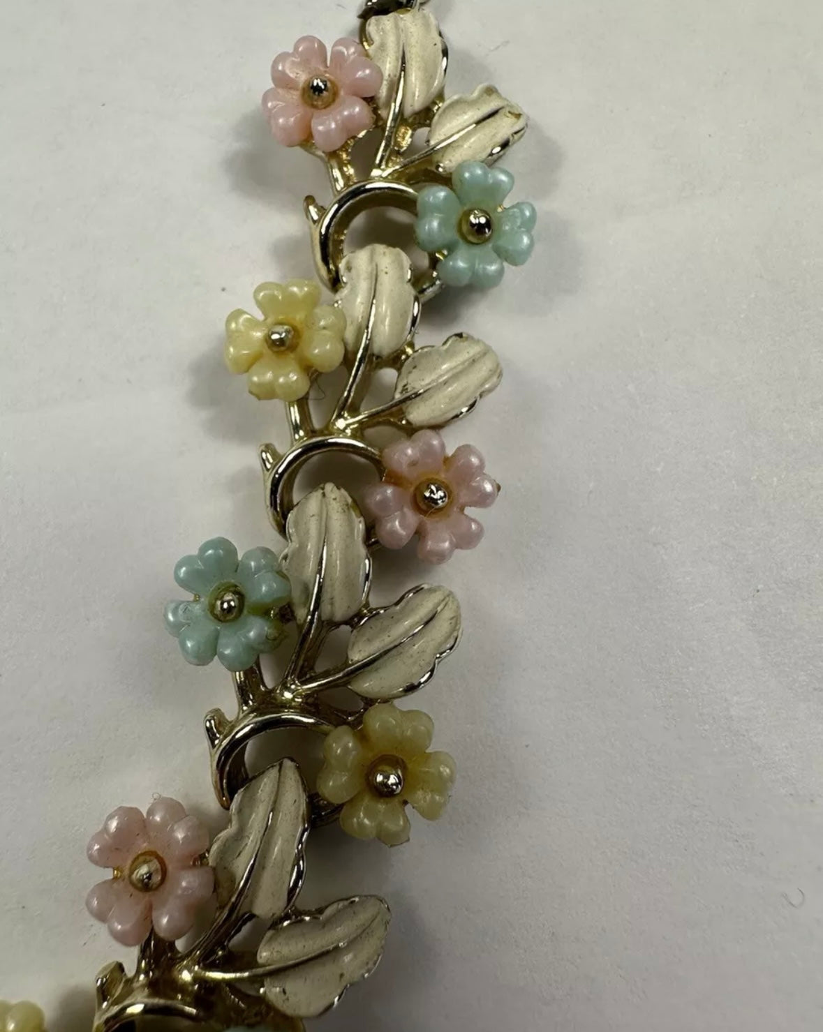 Mid Century Modern floral necklace with pastel enamel over gold toned metal